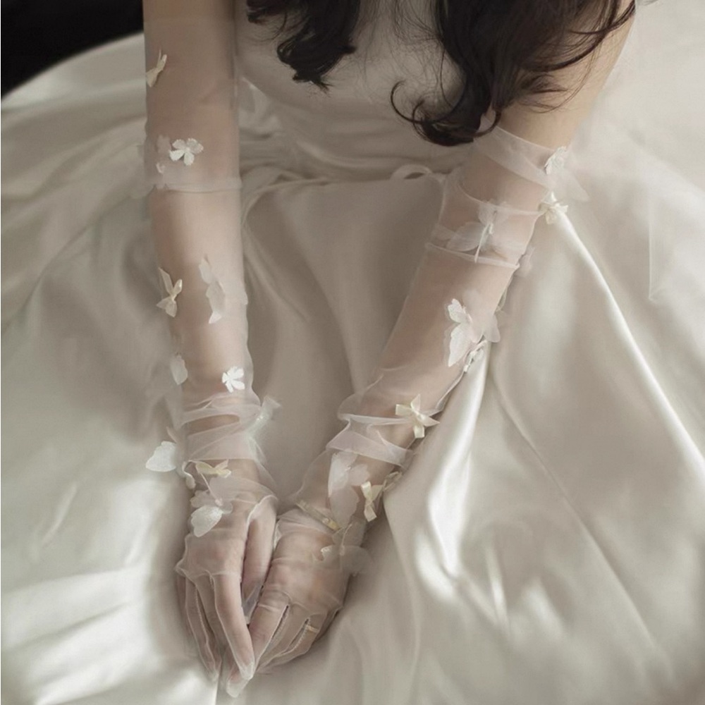 New Opera length tulle butterfly and bow embellished globes